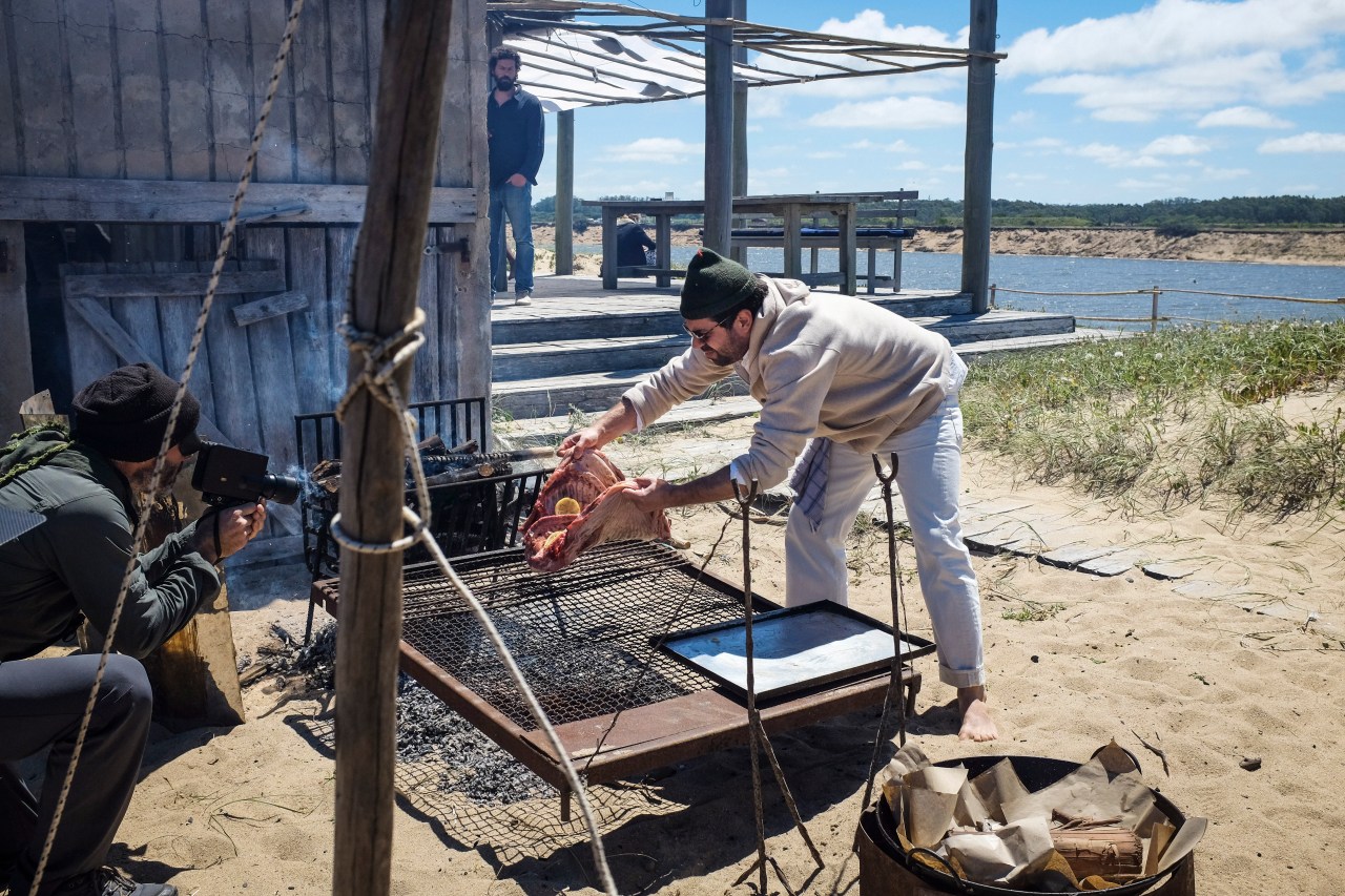 Ignacio "Nacho" Mattos cooking on the beach in Jose Ignacio, Uruguay.