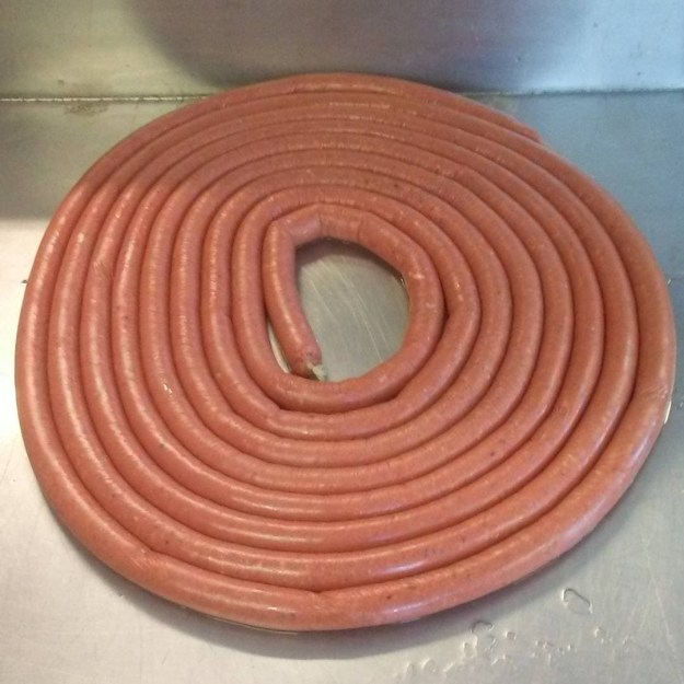 Making sausage at the shop in Renews.