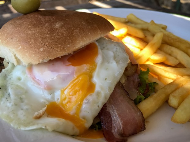 A Uruguayan chivito at Basta Pedro, the restaurant inside Puerto Camacho.