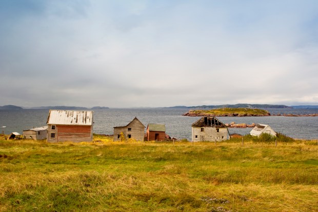 Abandoned houses in Red Cliff. Photo by Wayne Barrett & Anne MacKay via Getty Images.