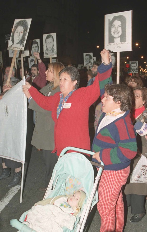 Protesters gathered in 1997 and demanded to learn the fate of political prisoners who disappeared during the military dictatorship. Photo by Miguel Rojo / AFP via Getty Images.