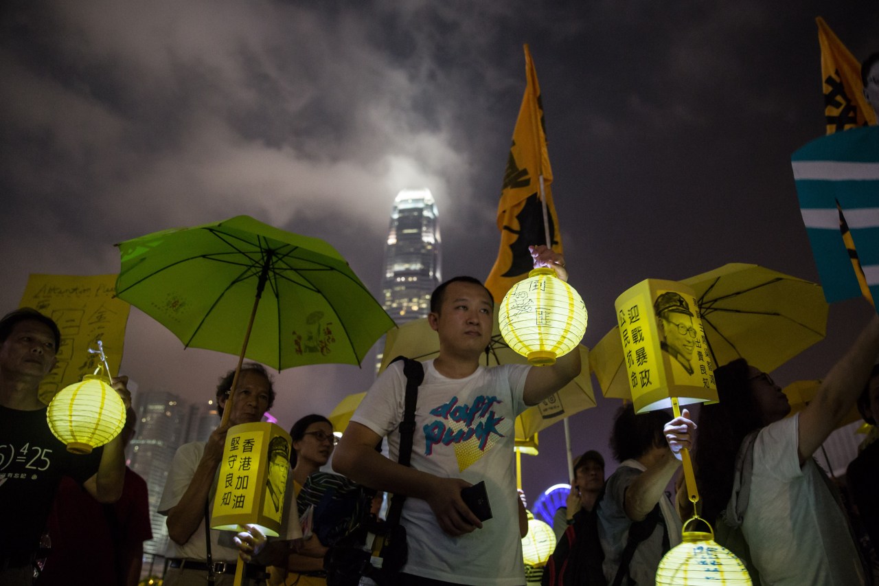 Activists march ahead of the anniversary of the Occupy Central protests. Photo by Anthony Wallace/AFP via Getty Images.