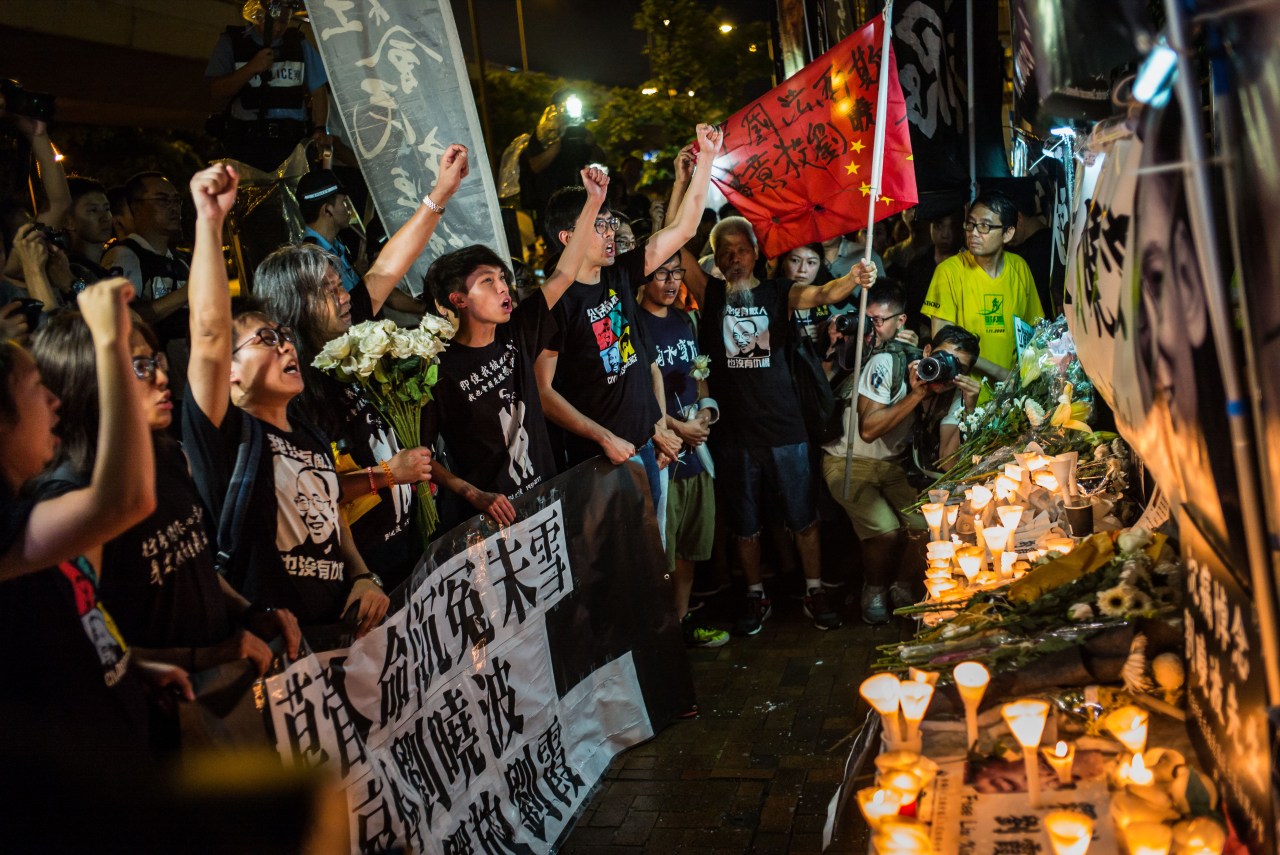 Protesters mourn the death of Nobel laureate Liu Xiaobo. Photo by Billy H.C. Kwok via Getty Images.