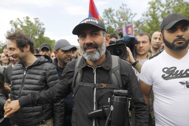 Pashinyan (center) during an opposition rally in April. Photo by Artyom Geodakyan/TASS via Getty Images.