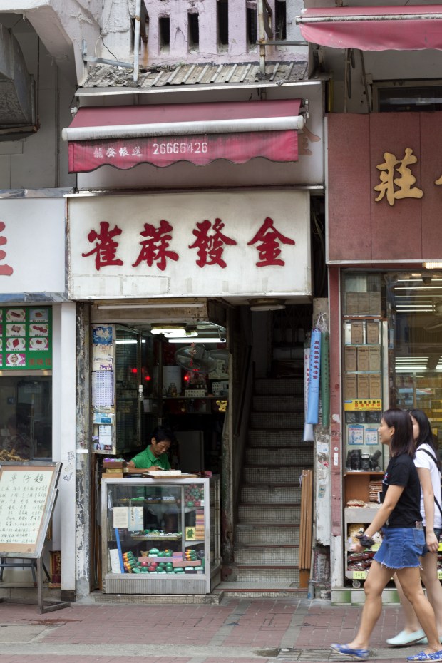 Ho Sau-mei works at her shop Kam Fat Mahjong in Hung Hom district.