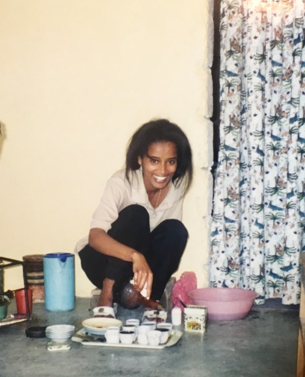 The author's aunt Ruth preparing coffee in Ethiopia.