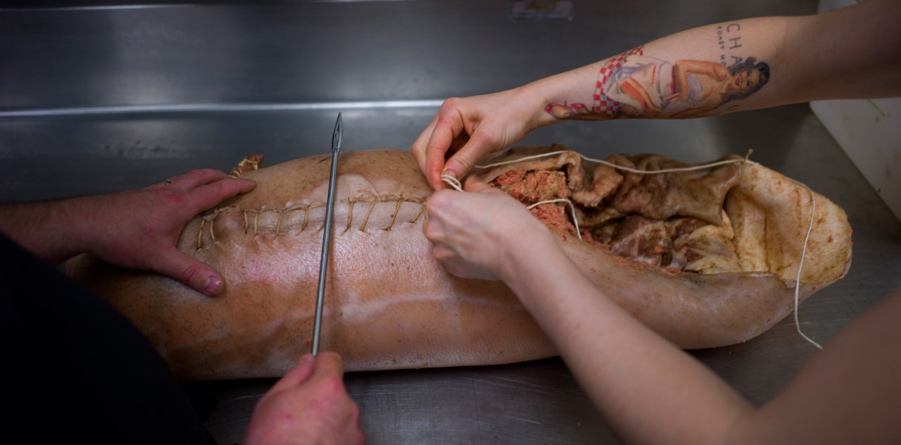 Connie DeSousa and John Jackson, from CHARCUT Roast House in Calgary, prep for Saturday’s BBQ.