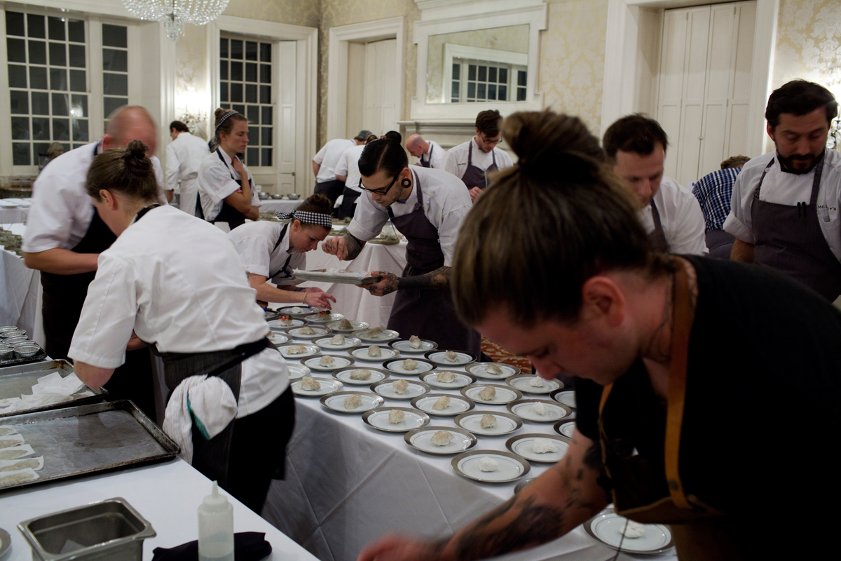 Plating madly upstairs at McCrady’s before Thursday’s dinner.