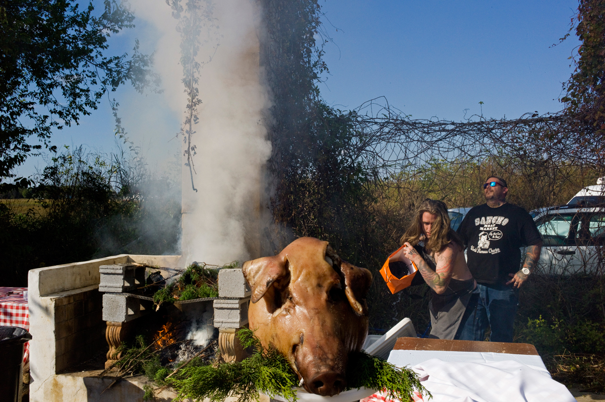 Brandon Baltzley and Matt Jennings and the pigs heads.