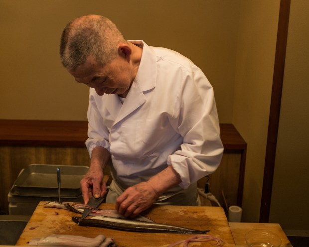 The master preps eel at a tempura restaurant in Tokyo.