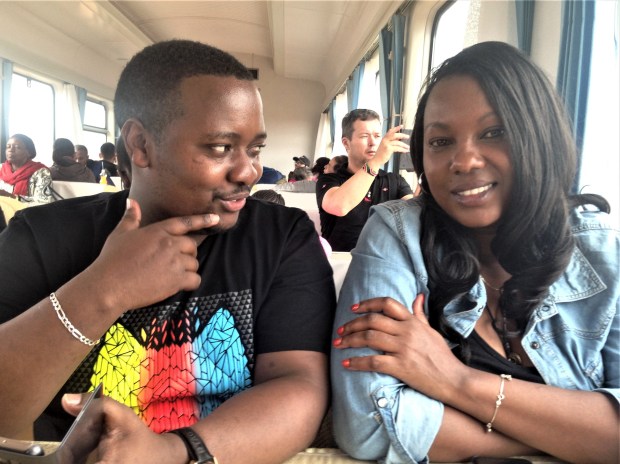 Anthony Rugutt and Monica Mutemi share a moment in the first class dining car.