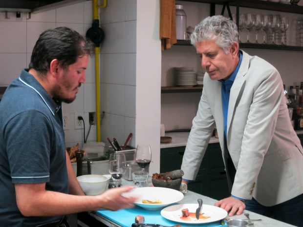 Bourdain eating with Casa Oaxaca chef and restaurateur Alejandro Ruiz Olmedo in Mexico.