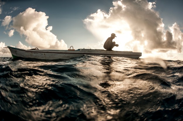 1. The coral triangle is a vast tract of ocean, some 6 million square kilometers, that encompasses Indonesia, Malaysia, Timor-Leste, Papua New Guinea, Philippines, and the Solomon Islands. 2. Preparing to go hand fishing.