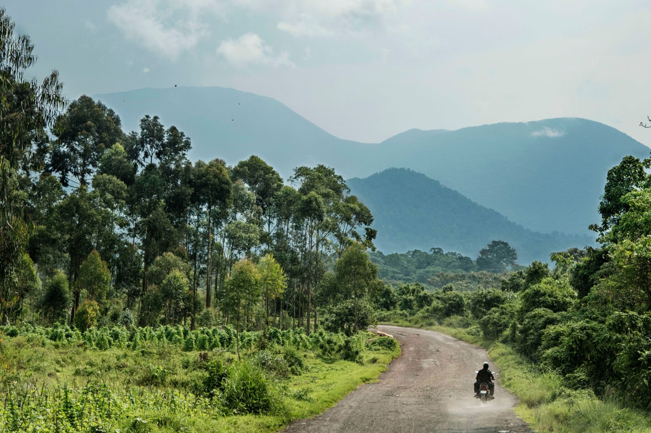 A dirt road leading to Nyiragongo volcano. Photo by Thierry Falise/LightRocket via Getty Images.