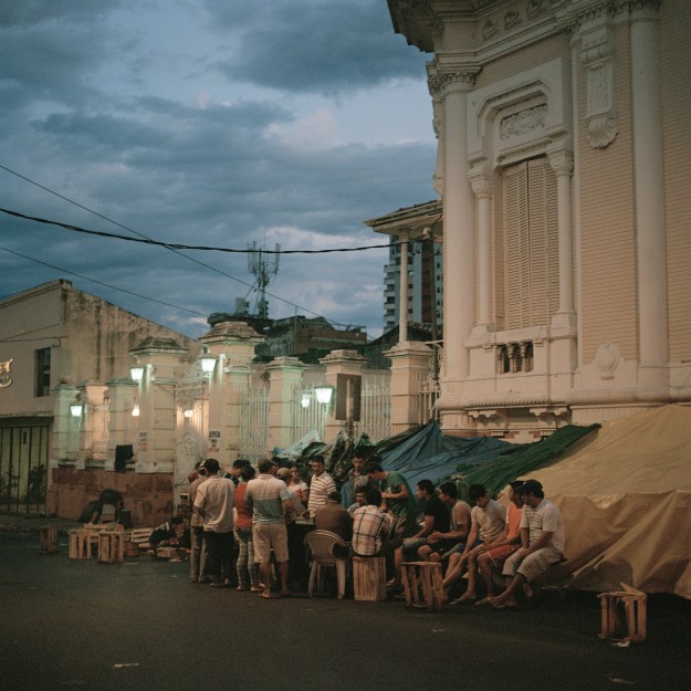 1: Landless farmers camp out in protest in front of the Institute for Rural Land Development. 2: Abelino Samistraro, a Brazilian-born farmer, switched from cattle to soy about 10 years ago.