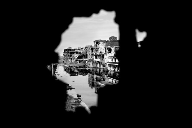 Buildings ravaged by fighting in downtown Sirte - October 2011.