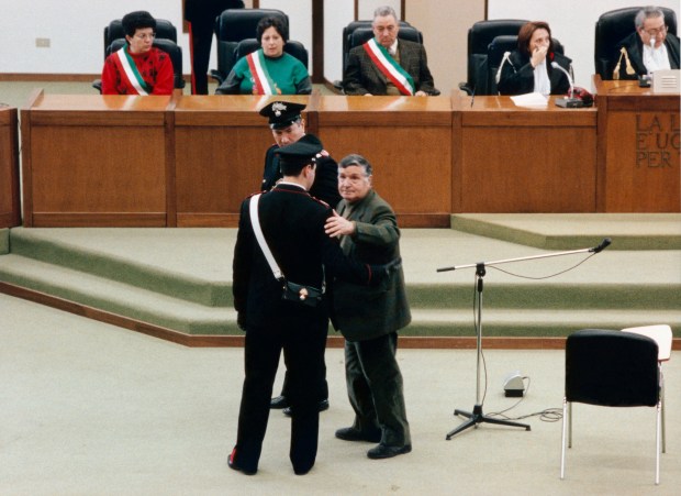 Salvatore Riina, the most important figure of the Sicilian mafia, on trial in 1993. Photo by Franco Origlia via Getty Images.