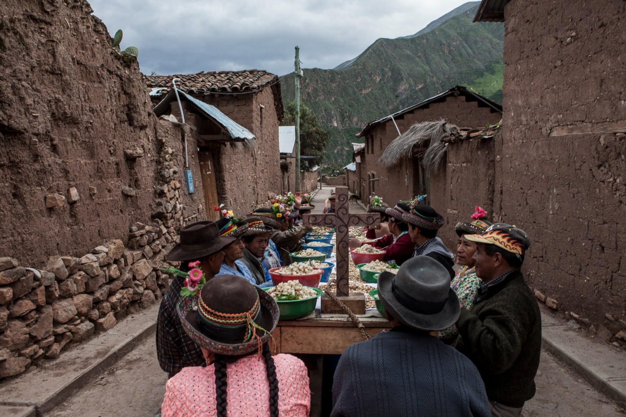 People from around the area feast in the streets of Sarhua.